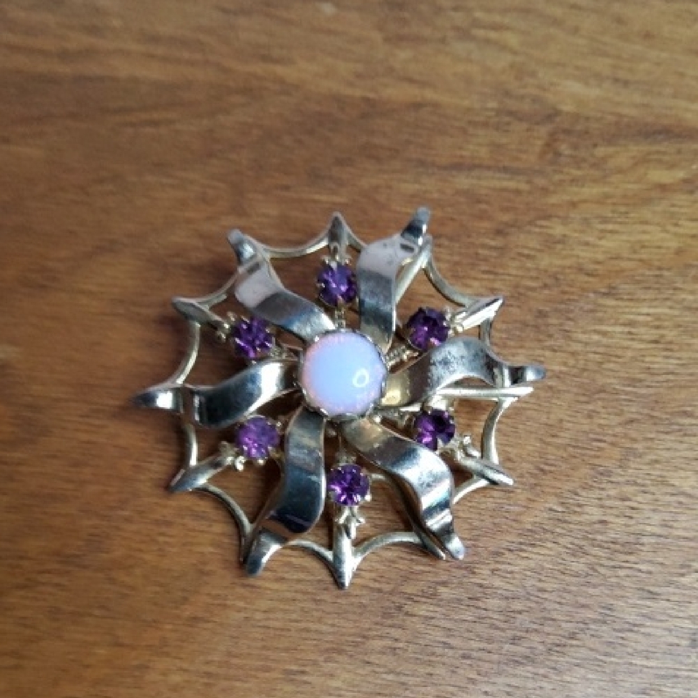 Vintage Pinwheel brooch with amethyst and moonstone.